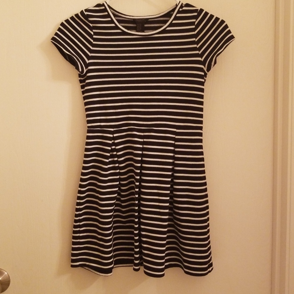 Adorable girl's black and white striped dress.